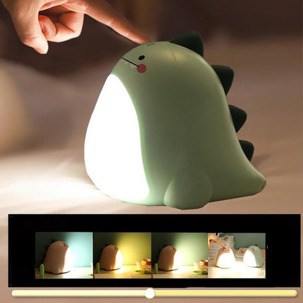 Grøn dinosaur natlampe med lysende mave