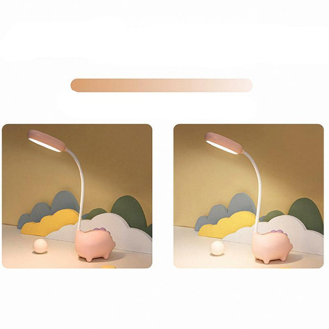 Lyserød skrivebordslampe formet som gris