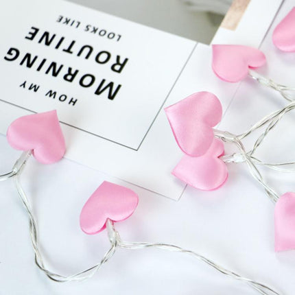 Lyskæde med lyserøde hjerter til børneværelse