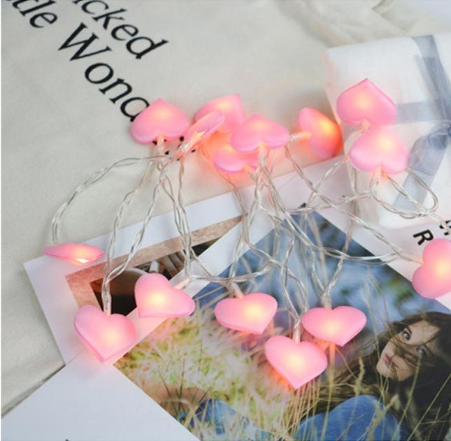 Lyskæde med lyserøde hjerter til børneværelse