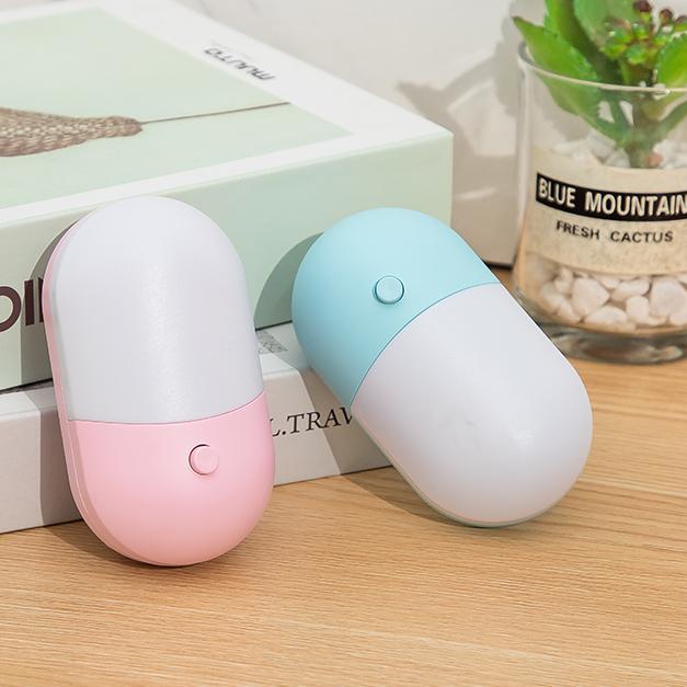 Tofarvet LED vågelampe til stikkontakt