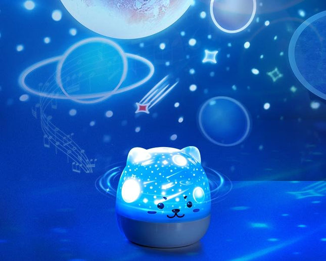 Natlampe projektor med stjerner og musik