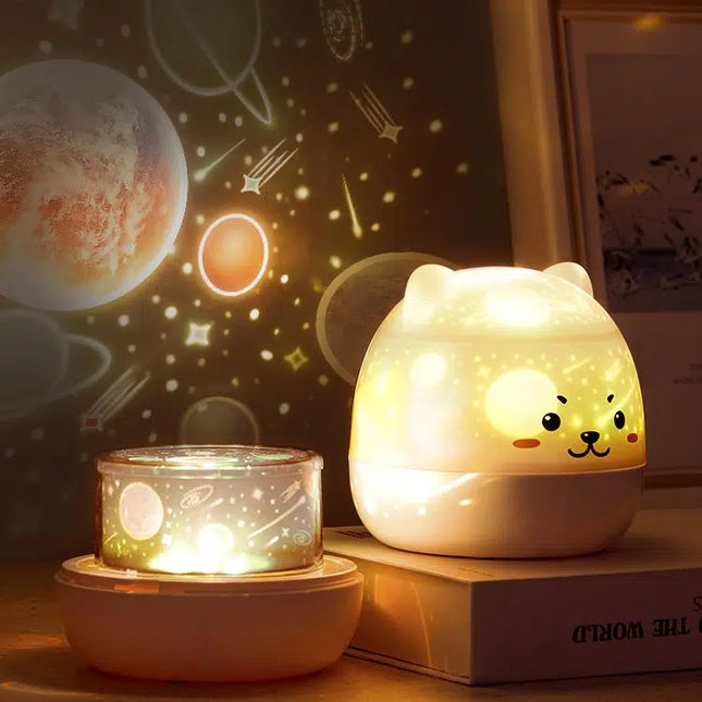 Natlampe projektor med stjerner og musik