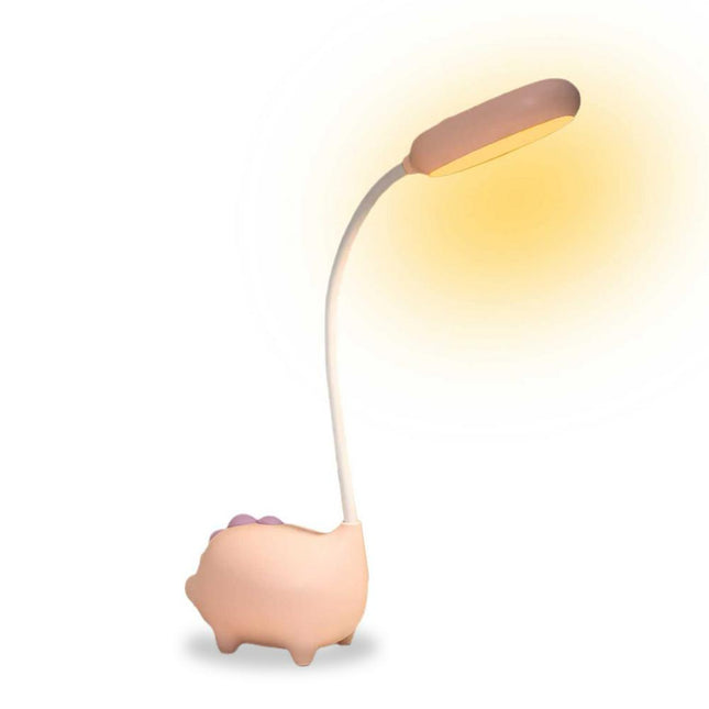 Lyserød skrivebordslampe formet som gris