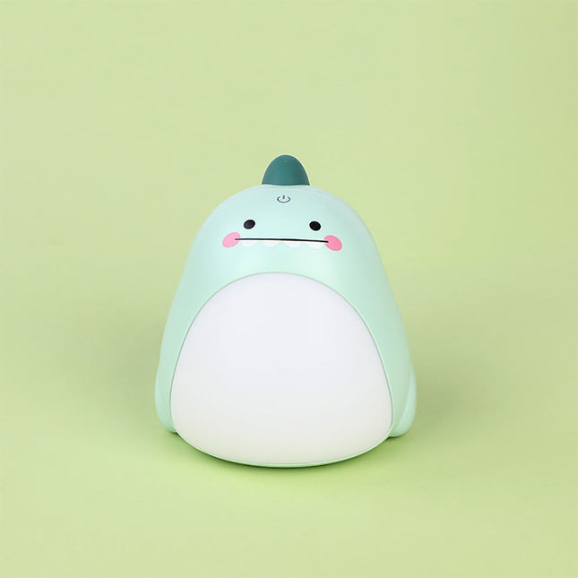 Grøn dinosaur natlampe med lysende mave