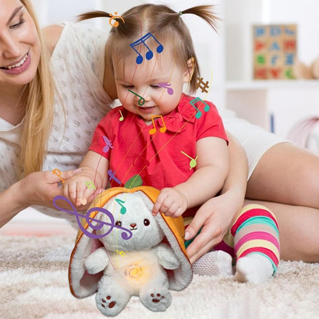 Kanin i gulerod plysdyr med lys