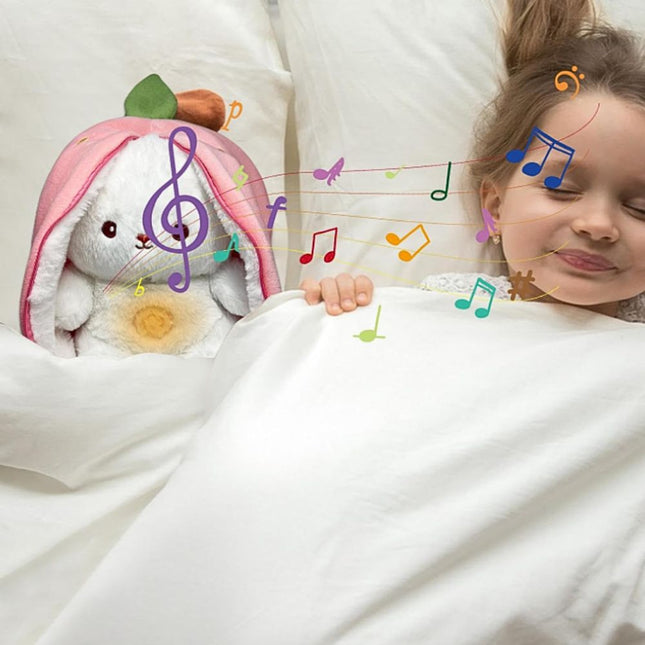 Kanin i gulerod plysdyr med lys