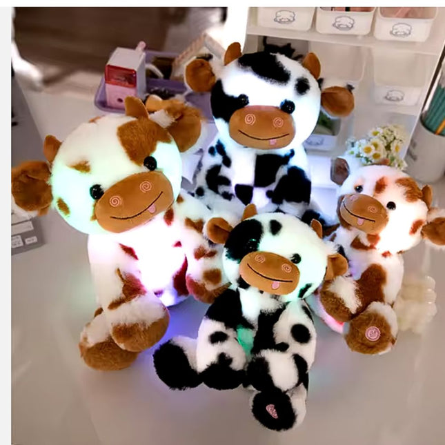 Sød ko plysdyr med LED lys