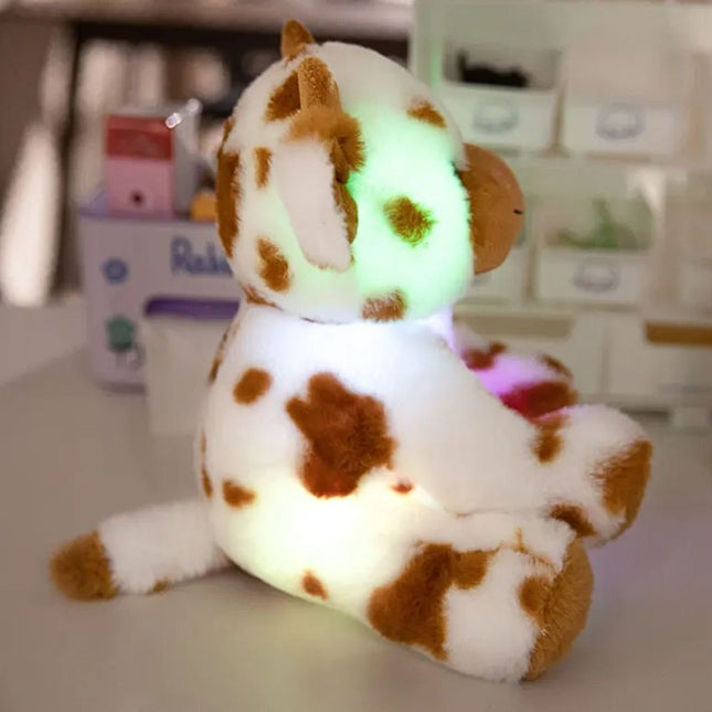 Sød ko plysdyr med LED lys
