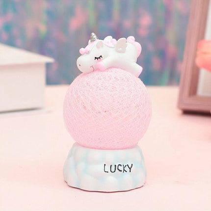 Lyserød enhjørning natlampe på lyskugle