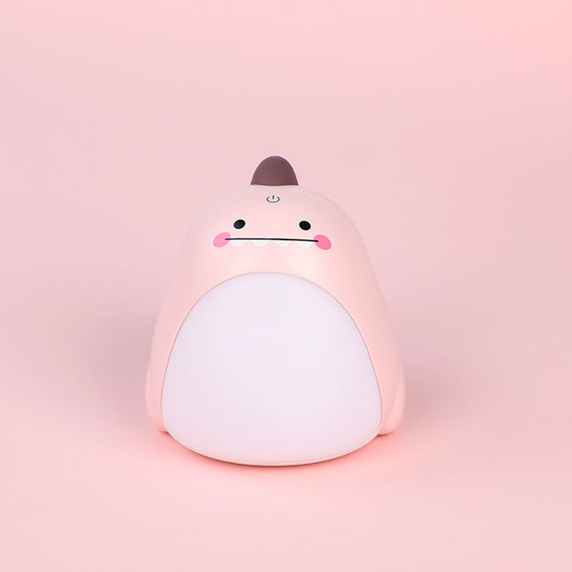 Grøn dinosaur natlampe med lysende mave