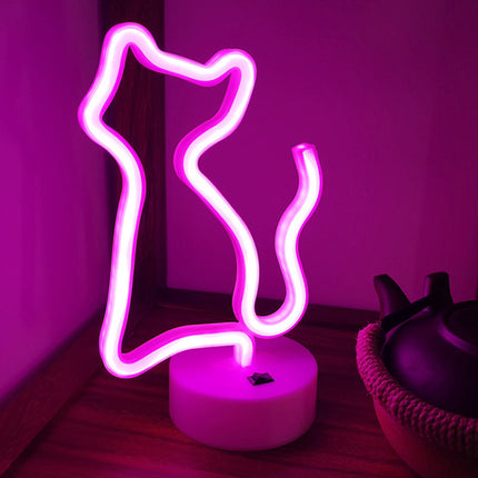 Lyserød neon lampe formet som kat