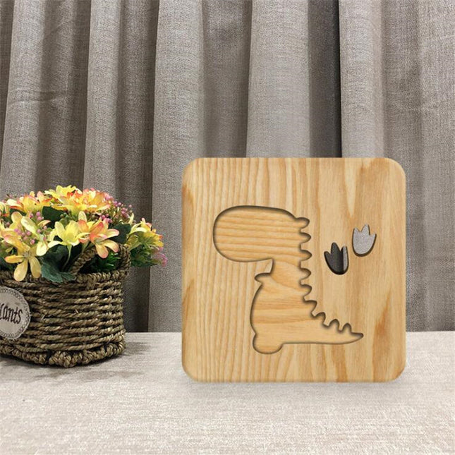 Dinosaur LED lampe i træ