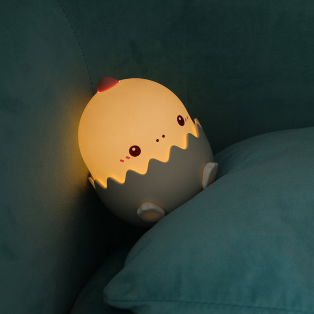 Farverig LED dinosaurus natlampe i æg