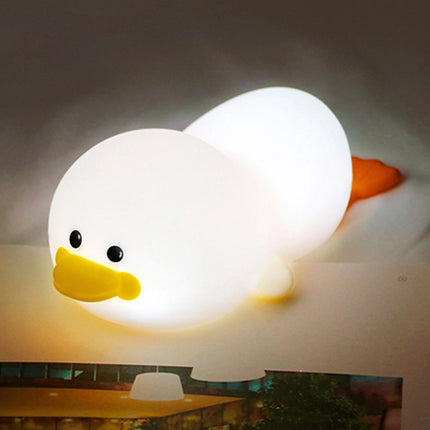 Lille liggende and natlampe i silikone