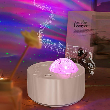 Stjerneprojektor med nordlys og musik