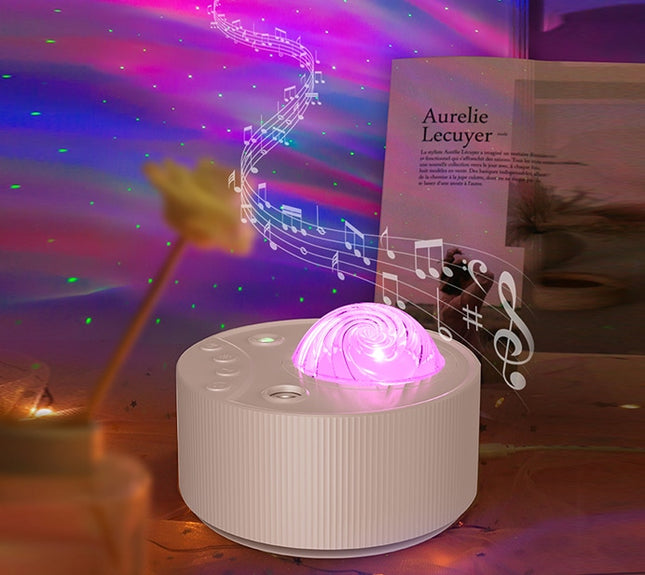 Stjerneprojektor med nordlys og musik