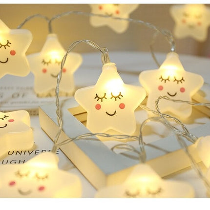 Dekorativ lyskæde med hvide stjerner