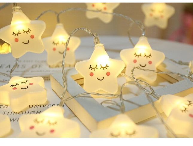 Dekorativ lyskæde med hvide stjerner