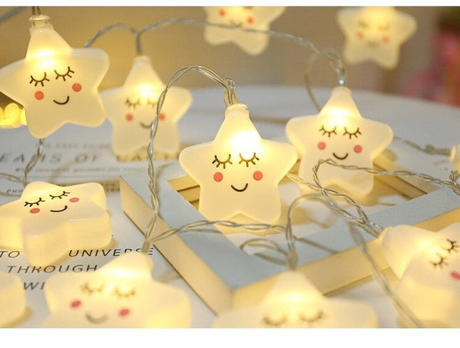 Dekorativ lyskæde med hvide stjerner