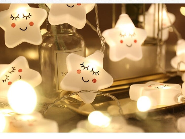 Dekorativ lyskæde med hvide stjerner