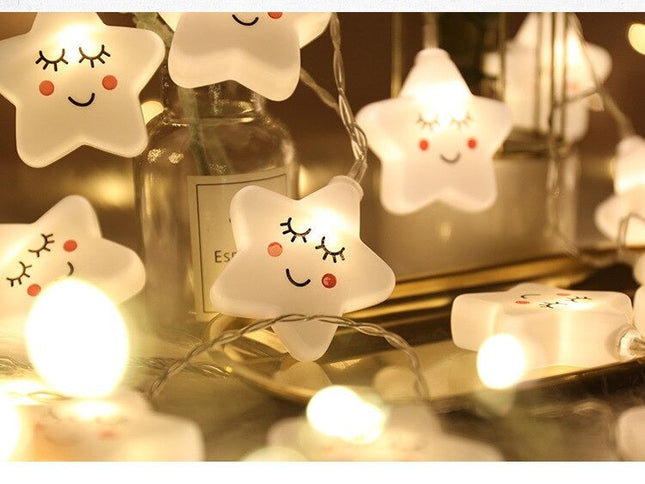 Dekorativ lyskæde med hvide stjerner