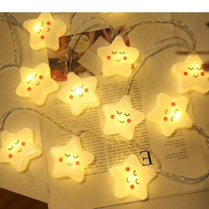 Dekorativ lyskæde med hvide stjerner