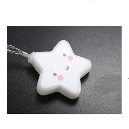 Hvid lyskæde med smilende stjerner