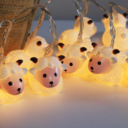 Sød lyskæde med små får