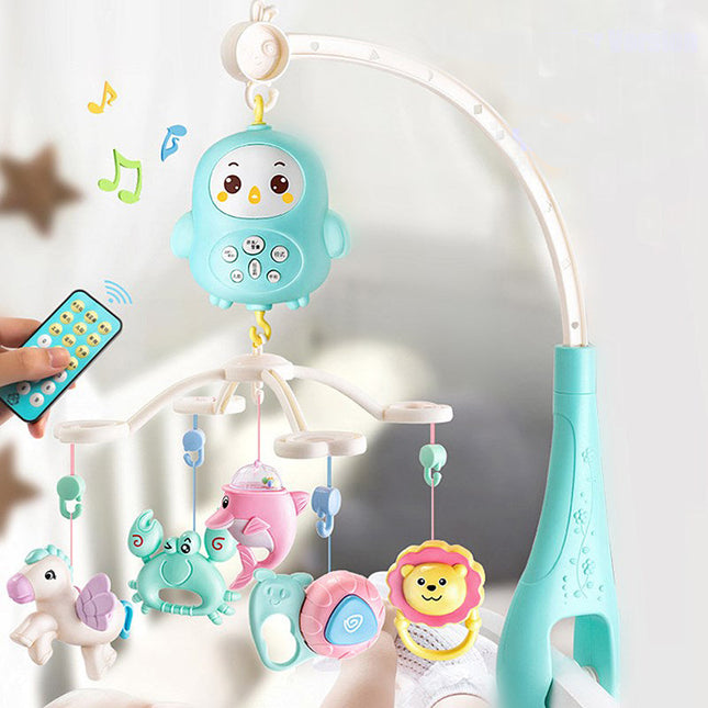 Musikuro med lys til baby tremmeseng