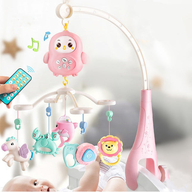 Musikuro med lys til baby tremmeseng